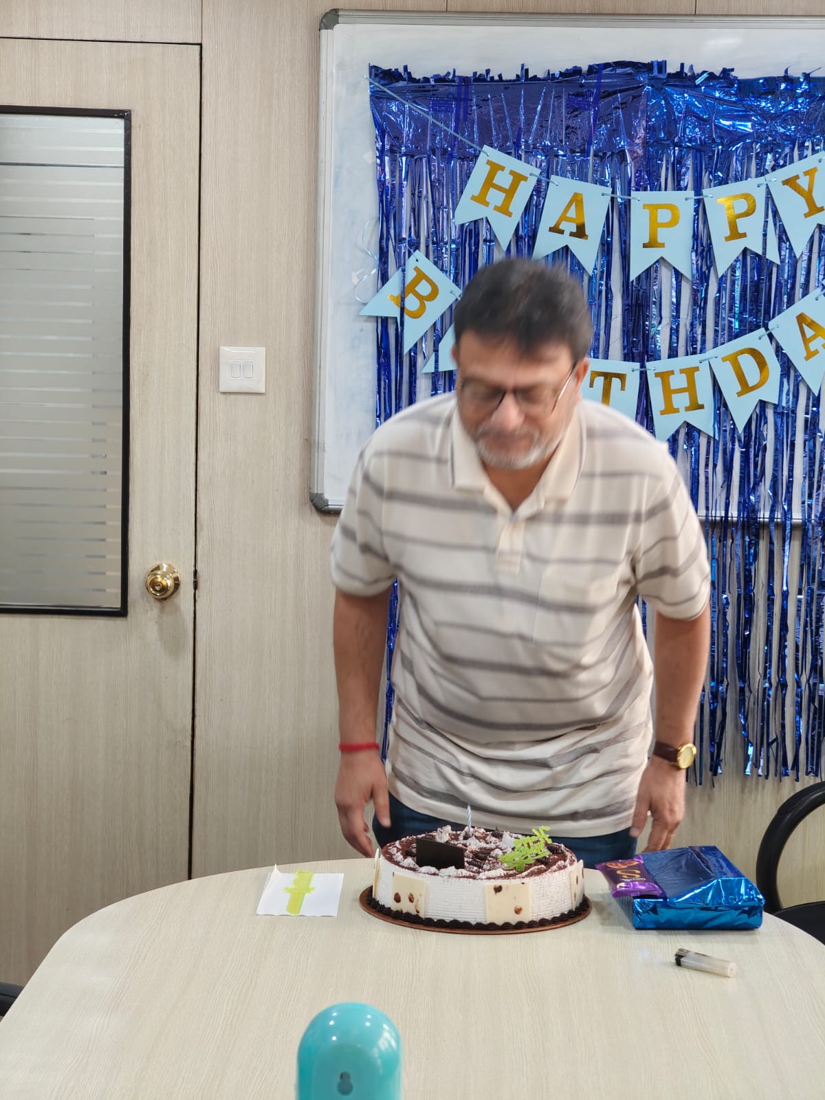 Candle blowing moment at birthday celebration